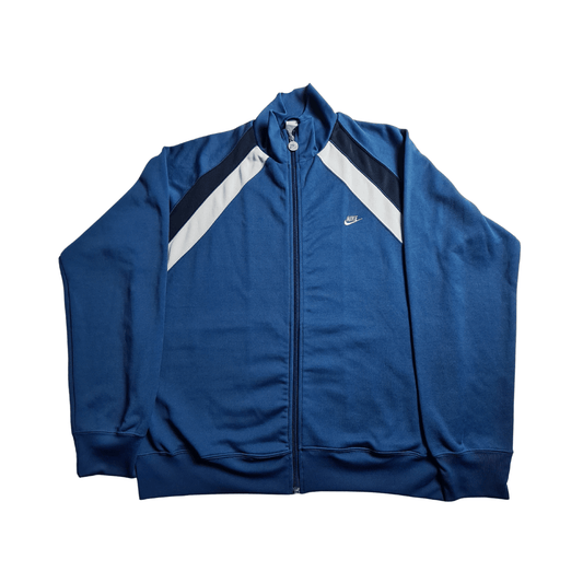 Vorderseite einer blau7weissen trainingsjacke von nike mit Logo