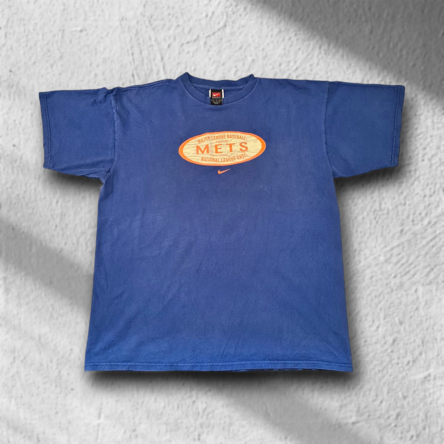 Vorderansicht des Nike New York Mets Vintage T-Shirts in Blau, Größe XL, mit orangem Logo-Print